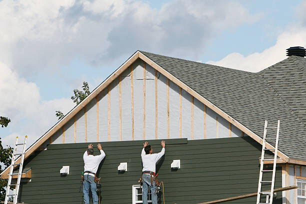 Professional Siding technician working in Springfield, MA